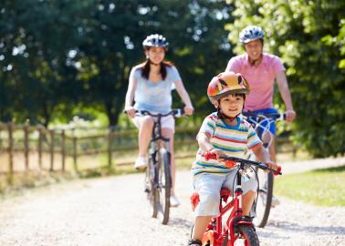 Family riding bikes