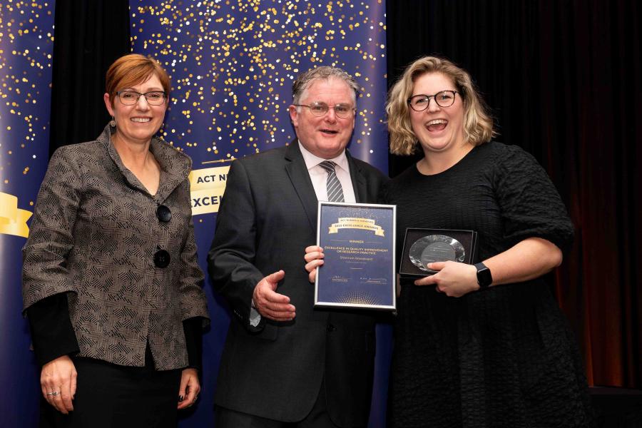 Photo of Award being accepted on Shannon’s behalf by her nominator – Rose Evans, Canberra Sexual Health Centre, CHS